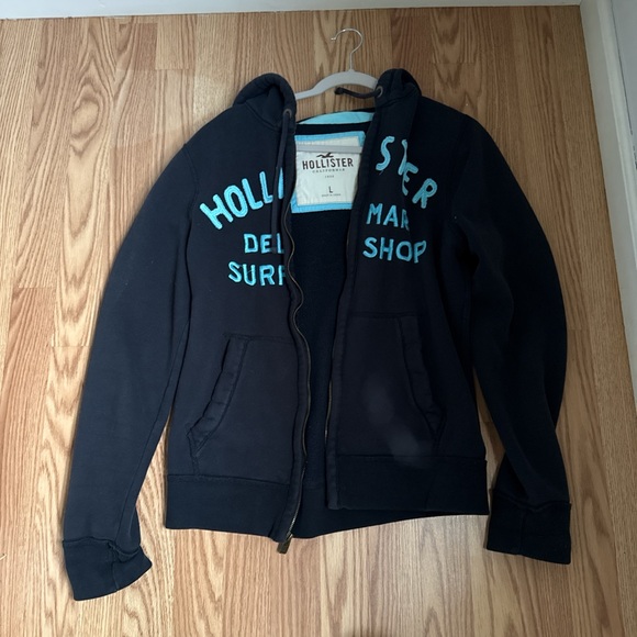Hollister Other - Hollister Black Hoodie with Teal/Seafoam Applique
